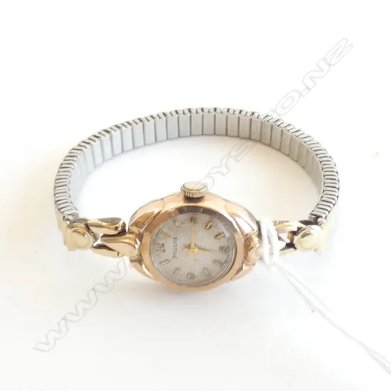 VINTAGE HELVETIA SWISS 9CT GOLD CASED WATCH..