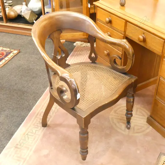 19TH CENTURY BOW ARMCHAIR WITH CANE SEAT (1 CASTOR A/F)