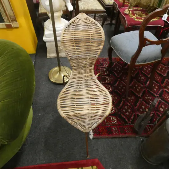 PEANUT CHAIR WITH 3 BRASS LEGS