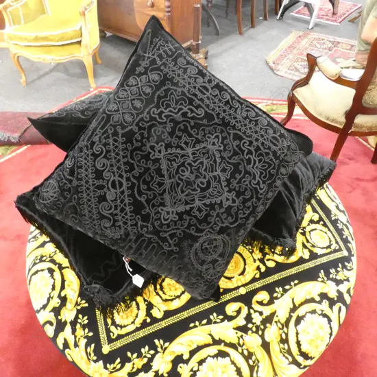 FOUR BLACK VELVET CUSHIONS