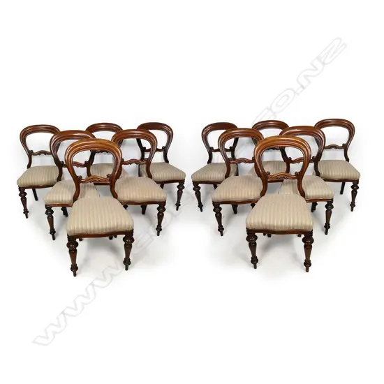 An uncommon set of twelve Victorian mahogany dining chairs,