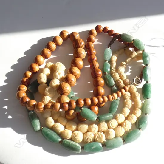3 NECKLACES; GREEN QUARTZ, CARVED WHITE BEADS, WOODEN BEADS