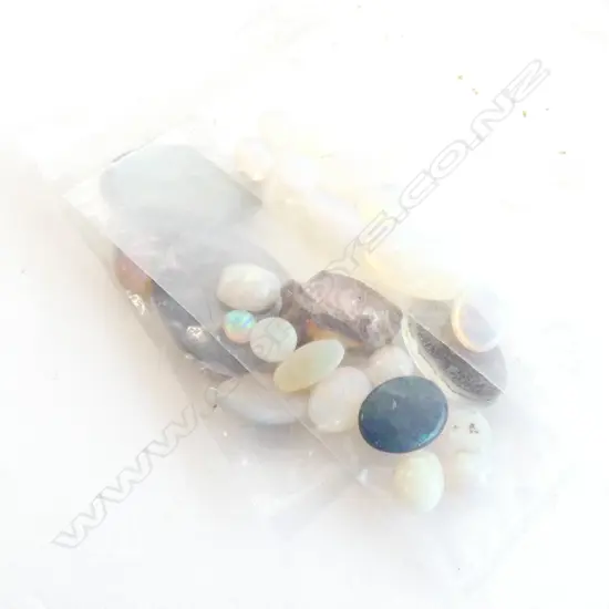 3 BAGS OF OPAL CABOCHONS. SOME DOUBLETS INCLUDED 25+