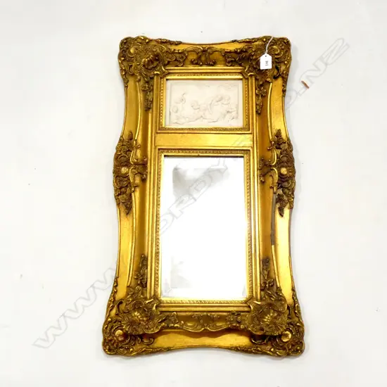 GILT FRAMED WALL MIRROR WITH BISQUE CHERUB INSET 380 X 680MM