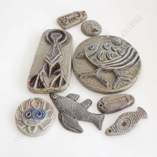 8 STYLISED SALT GLAZED WALL PLAQUES 115mm dia