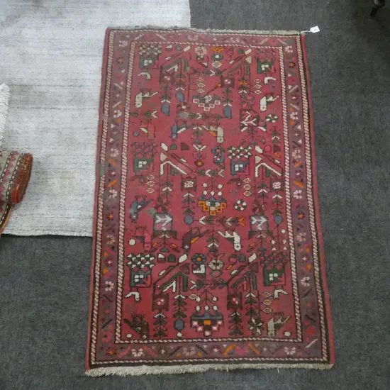 A HAND KNOTTED IRANIAN 1200 X 760 MM