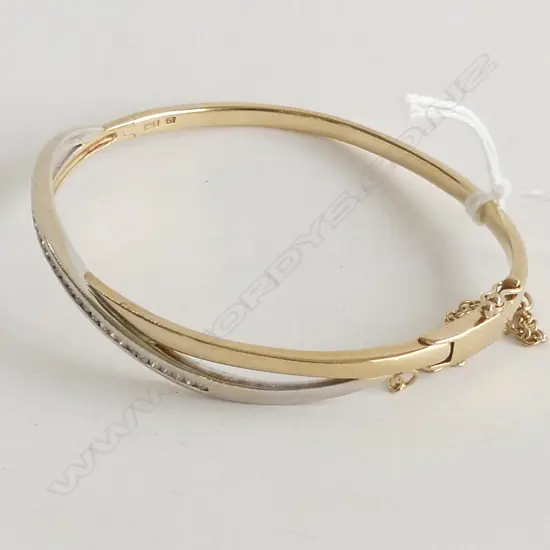 (82) 9CT GOLD Mjh DIAMOND SET BANGLE 0.40ct 15.1gm