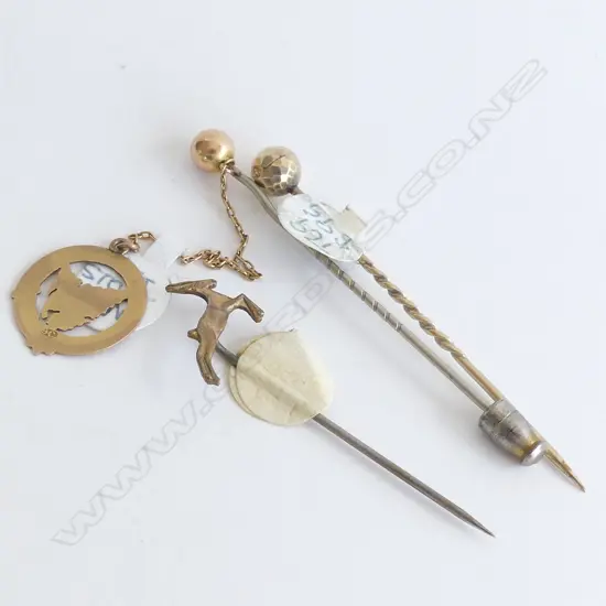 3x 9ct STICK PINS. 2 W STEEL PINS. 4.6GMS