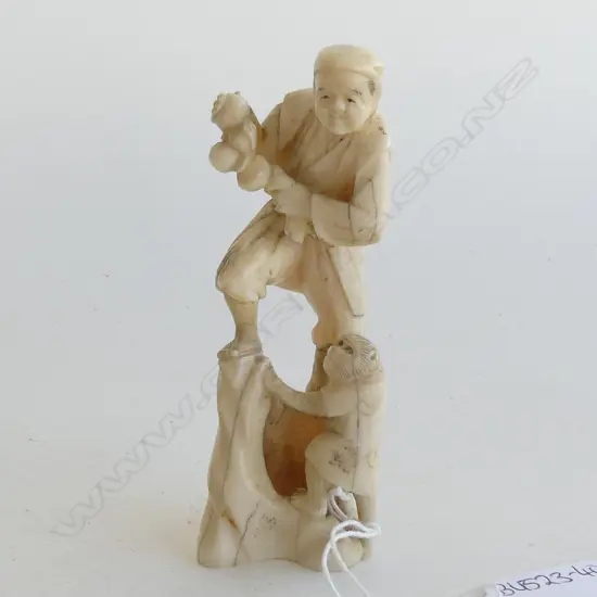 JAPANESE MARINE IVORY CARVED FIGURE WITH MONKEY signed