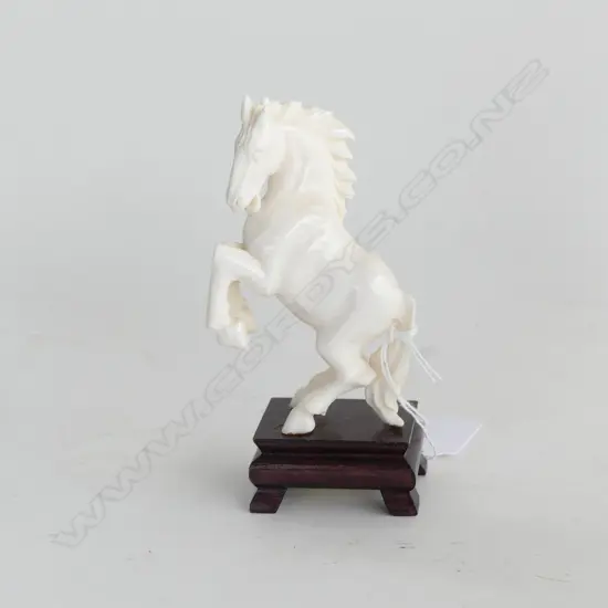 CARVED IVORY HORSE REARING - WITH WOODEN STAND H. 125MM