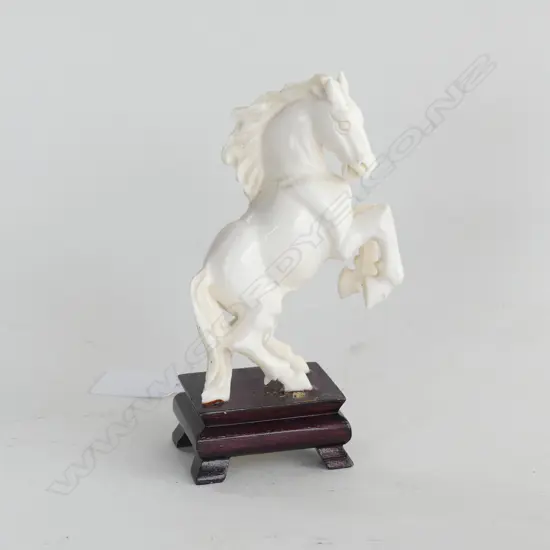 CARVED IVORY HORSE REARING - WITH WOODEN STAND H. 125MM