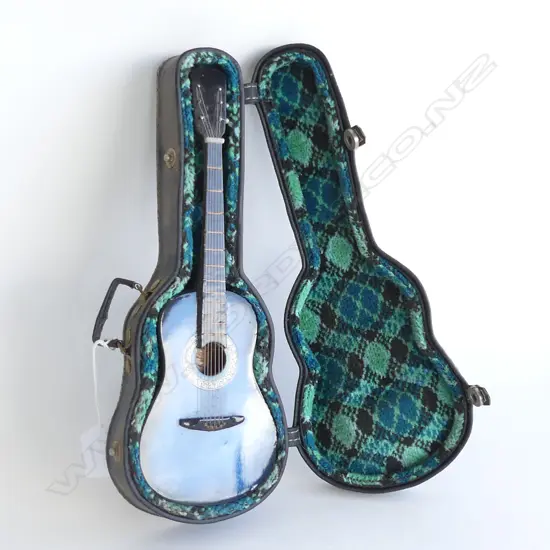 SMALL GUITAR IN CASE
