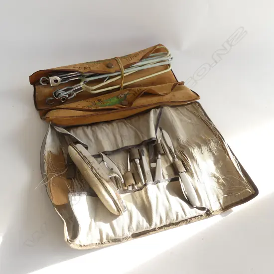 BOX LOT NZ SOUVENIR COATHANGERS IN POUCHES + MANICURE SET