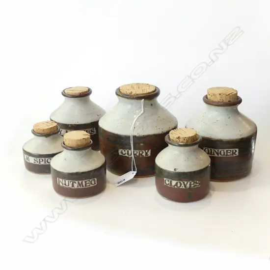 Spice pots - the two larger named 'Bay Leaves' and 'Ginger' three smaller (nutmeg /m spice / cloves) each with tenmoko glaze to the body