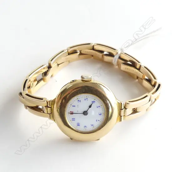 18CT VINTAGE WATCH 15CT STRAP (working) 27.4 GRAMS ##RTV##