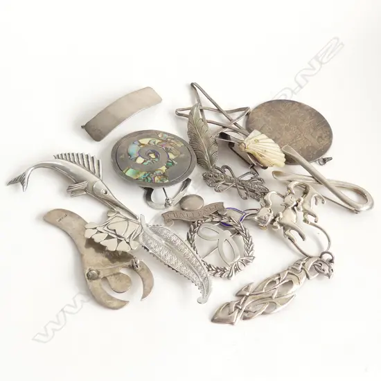 18 STG BROOCHES 125 GRAMS
