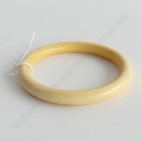 PLAIN IVORY CARVED BANGLE LABELLED purchased HK 1952...