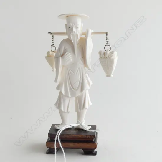 CARVED IVORY ORIENTAL MAN WITH BASKETS, ON WOODEN STAND, H 120MM