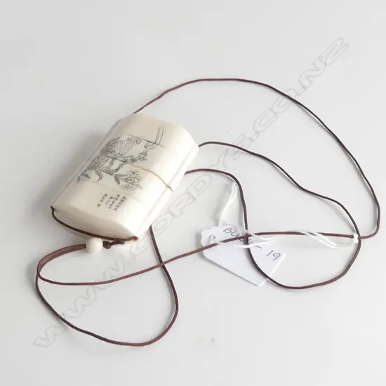 FINELY CARVED JAPANESE IVORY INRO - CARVED ON ONE SIDE WITH TRADITIONALLY DRESSED LADY & A PARROT TO OTHER SIDE H 75MM