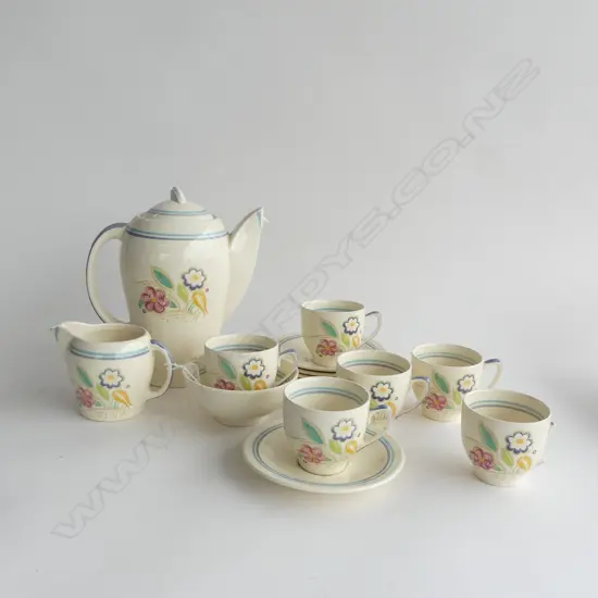 SUSIE COOPER 'NOSEGAY' DEMITASSE COFFEE SET; KESTREL SHAPE COFFEE POT, 6 C&S'S SUGAR BOWL & JUG, 1 CUP HANDLE IS A/F