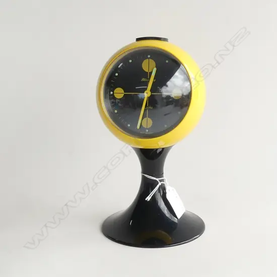 WESTERN GERMAN BLESSING YELLOW ALARM CLOCK ON STAND - WORKING H. 230MM