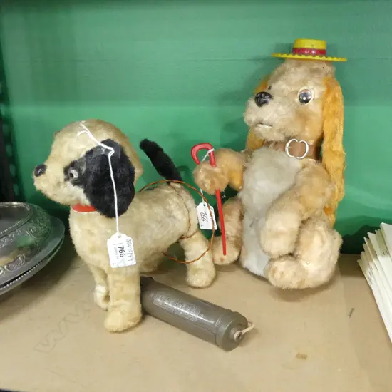 2 VINTAGE CLOCKWORK DOG TOYS 290mM