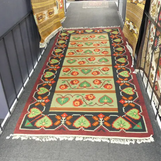 LARGE FLAT WEAVE RUG; FLORAL DESIGN w. BLACK BORDER 3015x1590mm
