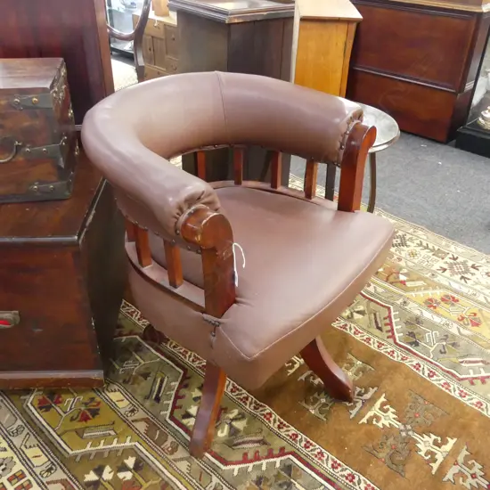 BROWN LEATHER CAPTAINS CHAIR 