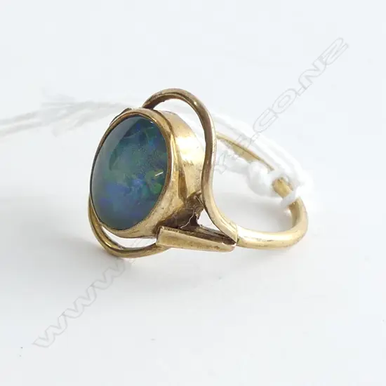 9CT GOLD RING OPAL DOUBLET PANEL SCROLLING FRAME 3.76gms