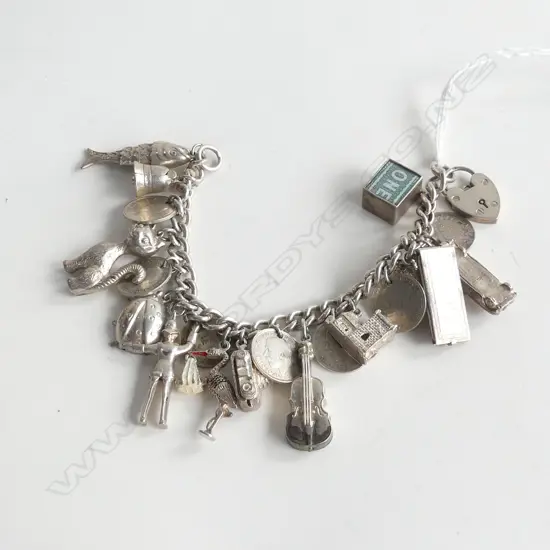 SILVER CHARM BRACELET LADEN W SILVER CHARMS