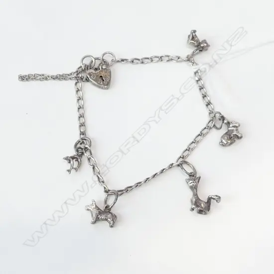 STG SILVER LOCKET CHARM BRACELET WITH 5 ANIMAL CHARMS