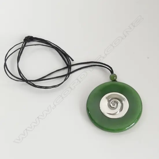 GREENSTONE AND 925 SILVER KORA DISC PENDANT