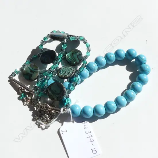 2 BRACELETS; 1 TURQUOISE BEAD WITH HEART & TURTLE CHARM & ONE PAUA SHELL & BEAD