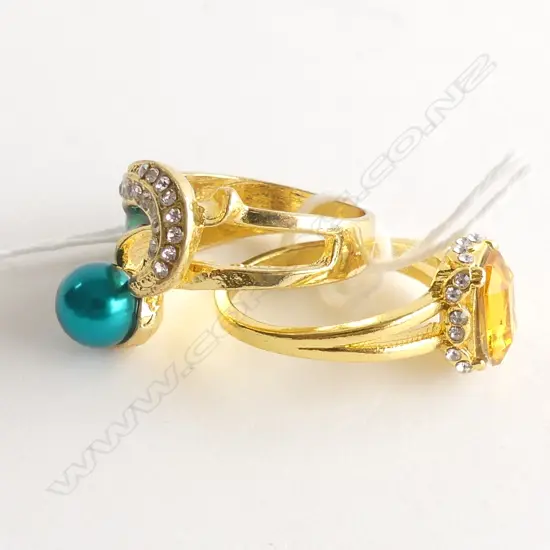 TWO FAUX GEMSTONE RINGS