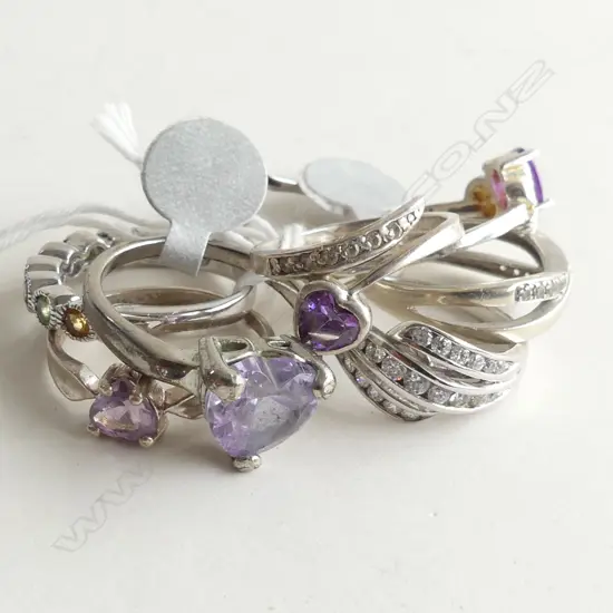 8 STG & PURPLE STONE RINGS 23 GRAMS