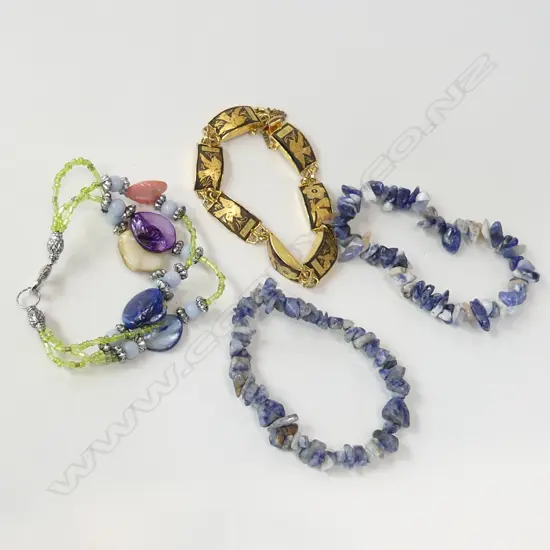 4 ASST BRACELETS; GOLD TONE & BRETT BLACK LINK + GLASS BEAD & STONE CHIP ETC..