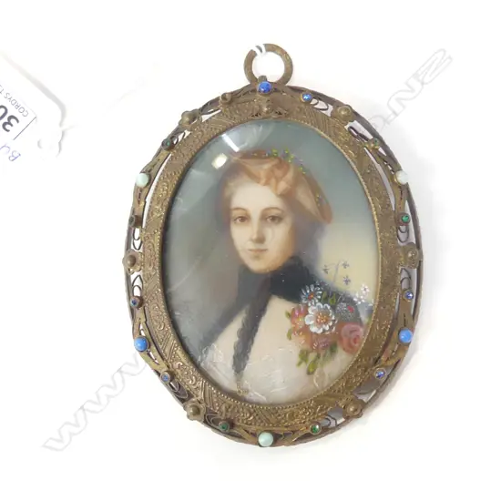 SM  GILT FRAMED CERAMIC PORTRAITURE OF LADY. FRAME STUDDED WITH STONES (110 X 95MM)