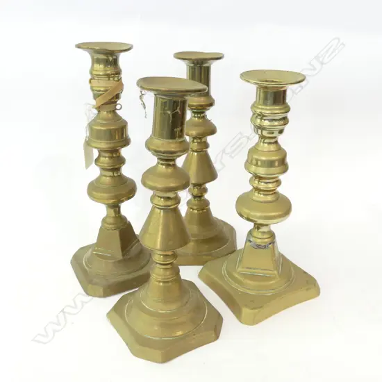 4 BRASS CANDLESTICKS