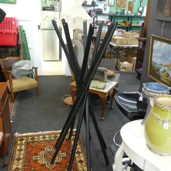 ZANOTTA (ITALIAN) MODERNIST CLOTHES RACK. RADIATING ebonised oak