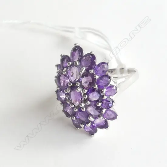 SILVER RING WITH MULTI AMETHYST STYLE STONES, SIZE O