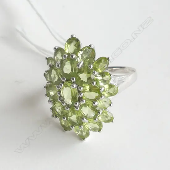 SILVER RING WITH MULTI PERIDOT STYLE STONES, SIZE O