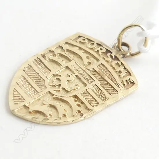 14ct. GOLD PORCHE SHIELD CHARM 1.7gm.