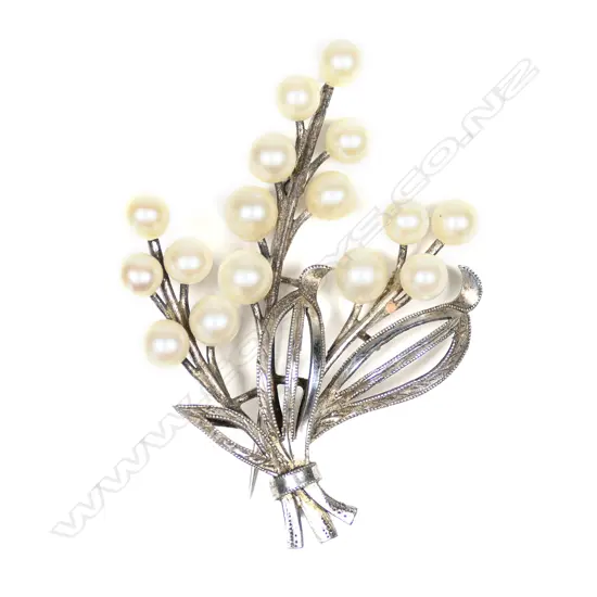 A silver floral spray cultured pearl brooch,