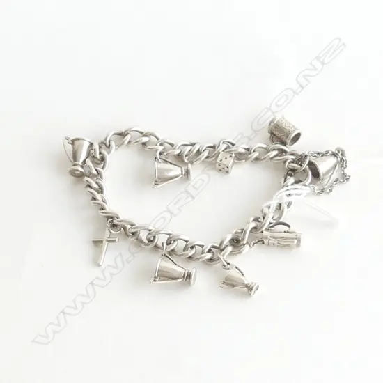 STERLING SILVER CHARM BRACELET WITH NINE CHARMS 45gm