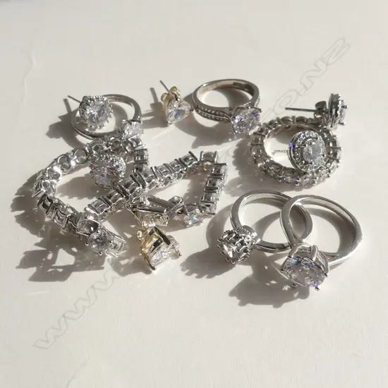 ASST. STG SILVER & FAUX DIAMOND JEWELLERY; 5 RINGS, BRACELET, 3 PRS EARRINGS 36gm.
