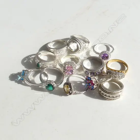 12 STG COSTUME RINGS 55gm.