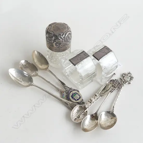 7 STG TEASPOONS 86gm. & 2 CRYSTAL & STG NAPKIN RINGS & STG TOPPED CRYSTAL BOTTLE