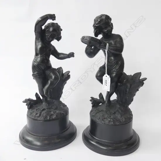 PR BLACK PAINTED SPELTER DANCING CHERUBS ON PLINTHS H.290mm