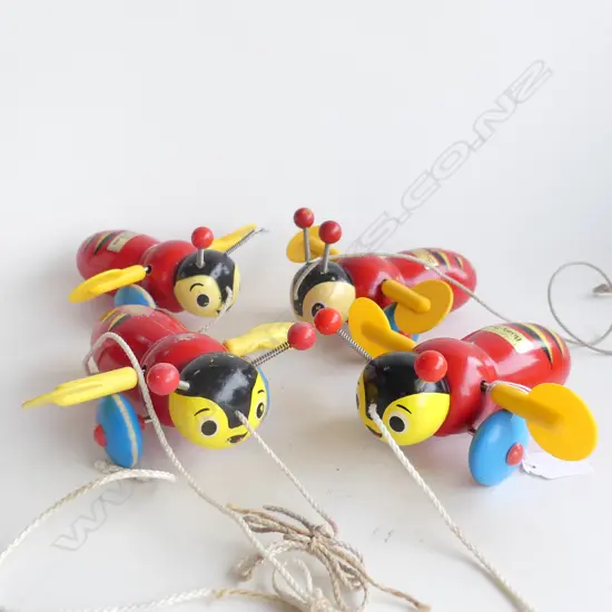 4 WOODEN BUZZY BEE TOYS