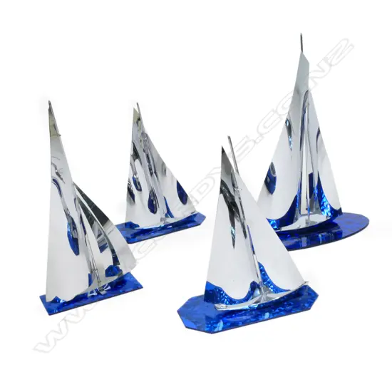4 ART DECO CHROME YACHTS, ON DARK BLUE GLASS BASES, H.270-350mm